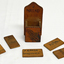 Wooden container surrounded by five wooden tiles with inscriptions