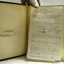 Typed notes and handwritten inscriptions inside the front cover