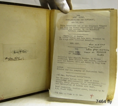Typed notes and handwritten inscriptions inside the front cover