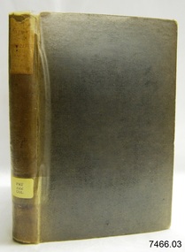 Textured hard cover with labels on spine