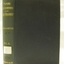 Green hardback cover with embossed gold text and label on spine