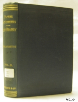 Green hardback cover with embossed gold text and label on spine