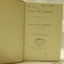 Black print on Fly page, and oval stamp and black handwriting