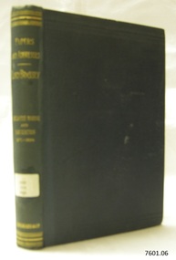Green hardcover book with embossed gold letters and a label on the spine