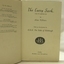 Fly page has title and publisher details and symbol