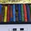 Pastels inside tin, many broken