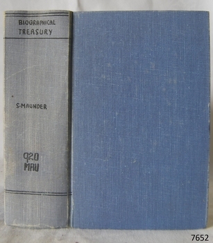 Blue cloth hardcover book with inscriptions on the spine