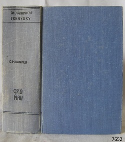 Blue cloth hardcover book with inscriptions on the spine