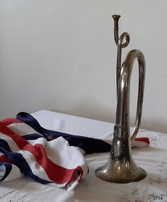 Decorative design on bugle is visible at this angle