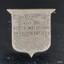 Silver shield engraved with the year's winner