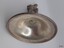 Silver underside of the domed lid has a smooth surface