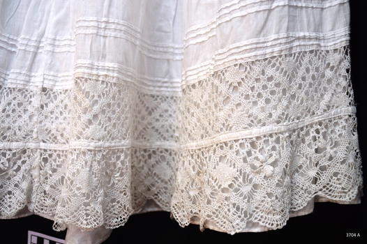 Intricate lace trim on the bottom of the petticoat