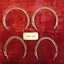 Two pairs of racing plates, horseshoes