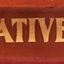 Gold leaf text on timber frame of case