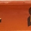 Text in gold leaf advertises the maker's trade
