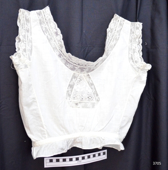 Cotton fabric with lace trim inserts and ribbon