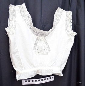 Cotton fabric with lace trim inserts and ribbon