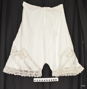 Bloomers have short leg with lace trim. Lace is also inserted into the fabric in the thigh area
