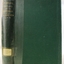 Green cloth hardcover book with gold embossed text on the spine