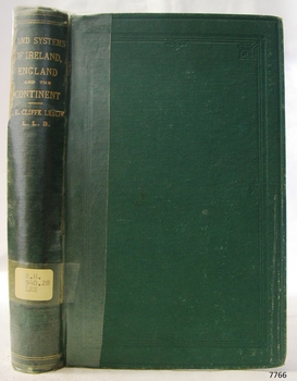 Green cloth hardcover book with gold embossed text on the spine