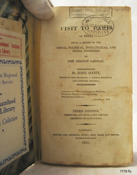 Inscriptions on the Fly page include black printed text, handwritten text and two stamps