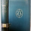 Green-blue hardcover with embossed text and logo on spine and cover