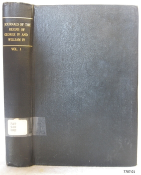 Green hardback cover with embossed gold text on the spine
