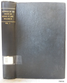 Green hardback cover with embossed gold text on the spine