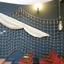 Cargo net spread wide along a wall