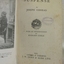 Printed page with stamp and opposite sketch in black and white