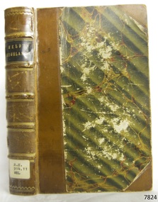 Diagonal light and green striped cover on hardcover book with brown reinforced spine and corners