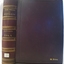 Brown hard covered book with embossed gold letters