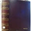 Brown hard cover with embossed gold text