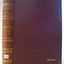 Hard cover with gold embossed text
