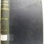 Green-blue hardcover with embossed gold text and label on spine