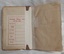 Endpaper has label attached. Inside cover has tape repairs and feint oval stamp