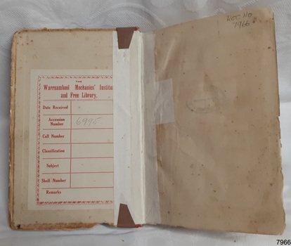 Endpaper has label attached. Inside cover has tape repairs and feint oval stamp