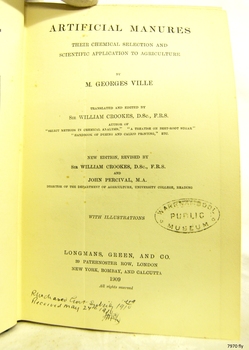 Black text with oval stamp and handwritten black ink