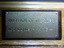 Rectangular plague with details impressed regarding the item