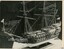 Semigloss sepia photograph of the model ship "Sovereign of the Seas" from a side view. 