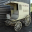 An 4 wheeled bakery delivery cart/wagon, painted in yellow with brown writing of the business name: H.R. Smith & Co, a Warrnambool baker.