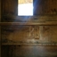 An opening inside the covered cart allows for goods to be passed through