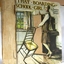 Book's spine, damaged, and coloured illustration on the front cover