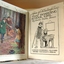 Book's fly page with a coloured illustration opposite.