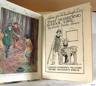 Book's fly page with a coloured illustration opposite.