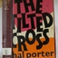 Hardcover brown book with pasted on, coloured front cover and gold embossed text on spine
