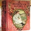 Upright hardcover book with print on spine and voer, and a cameo of a female on te cover
