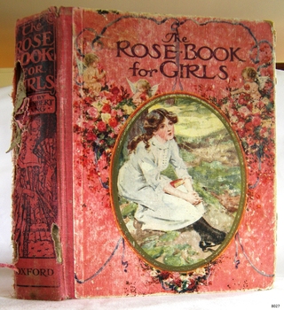 Upright hardcover book with print on spine and voer, and a cameo of a female on te cover