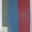 Red hardcover book with reinforced spine, title printed on spine and embossed in gold on cover