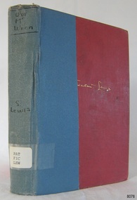 Red hardcover book with reinforced spine, title printed on spine and embossed in gold on cover